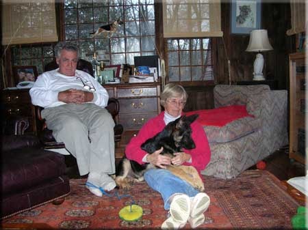 Barbara and Frank Lopez at home with King Kong as a puppy